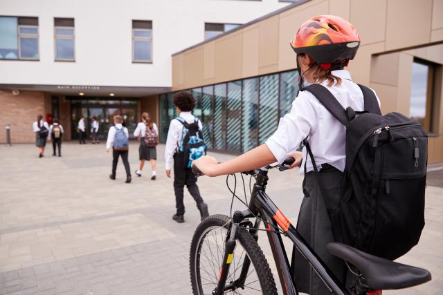 students arriving at a school